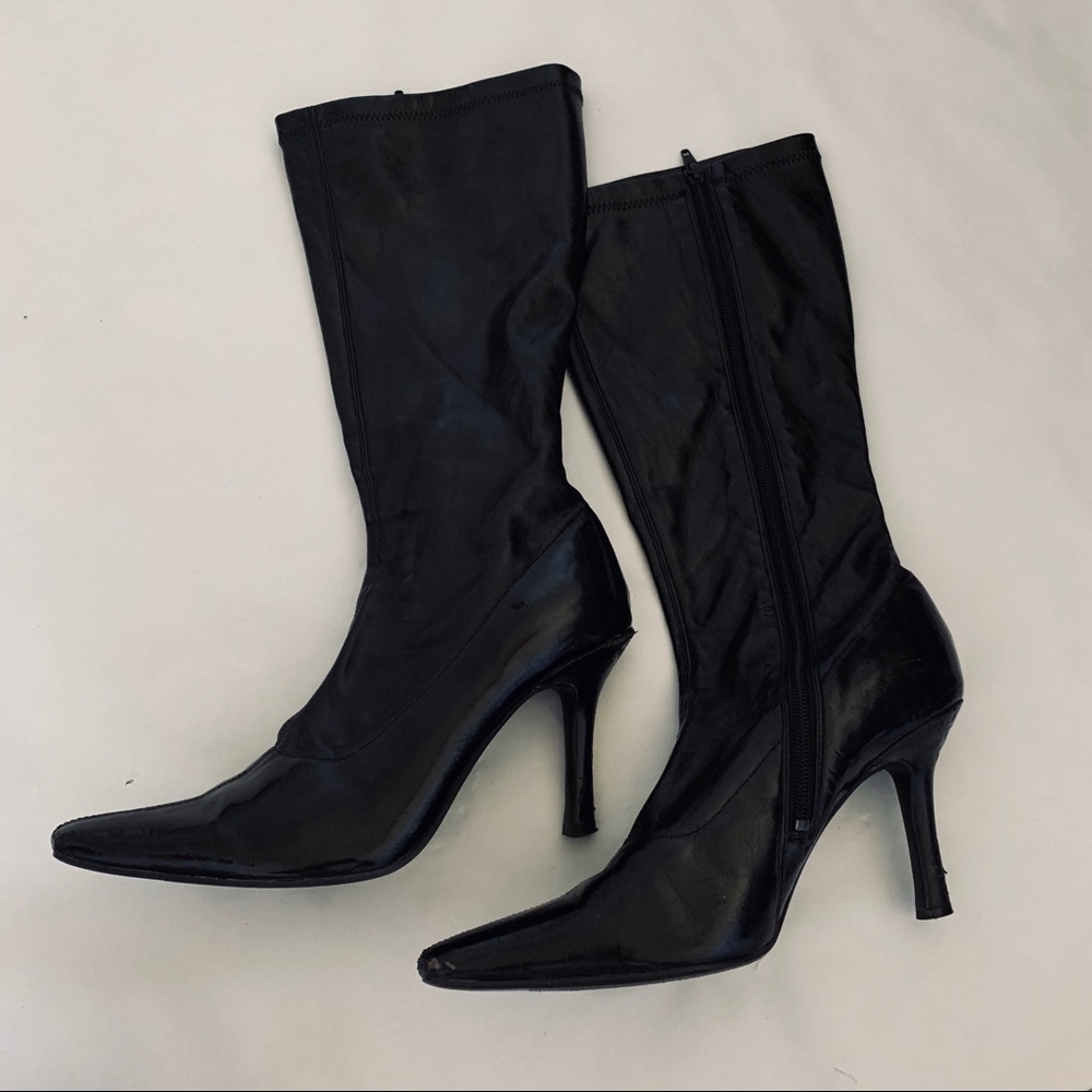 Tall black heeled boots